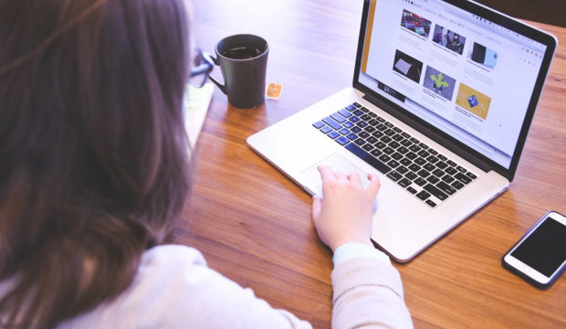 Woman Using Laptop